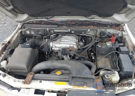 2004 Mitsubishi Montero Xls z USA, uszkodzony, nr VIN JA4MW51S64J005453